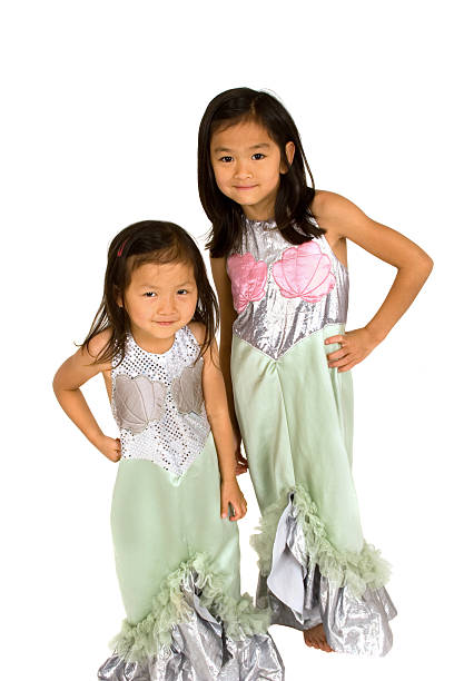 Chinese sisters dressed up as mermaids